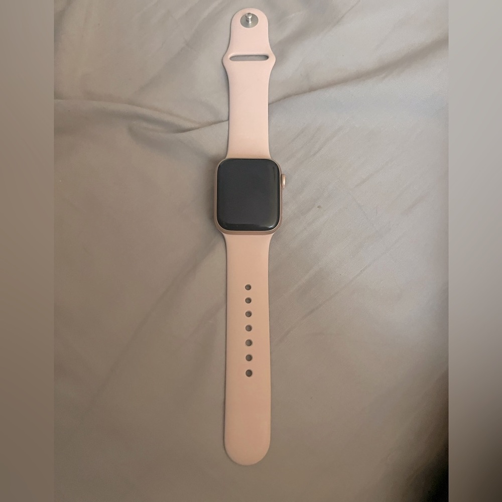 Apple Watch Series 6, rose gold casing with a set of ten straps